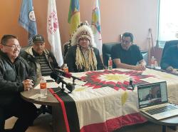 Chiefs sit at a press conference table