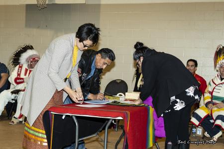 Councillor Tracy McHugh signs official documents
